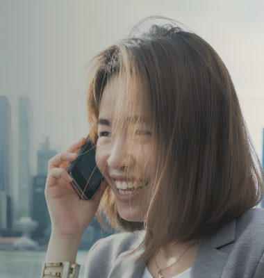 Trader on the phone in an Asian city